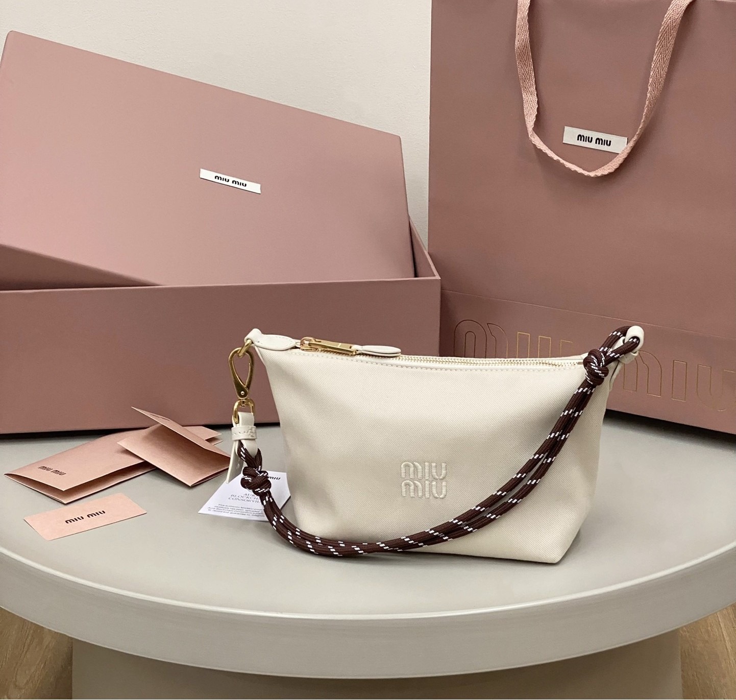 미우미우 게버딘 파우치