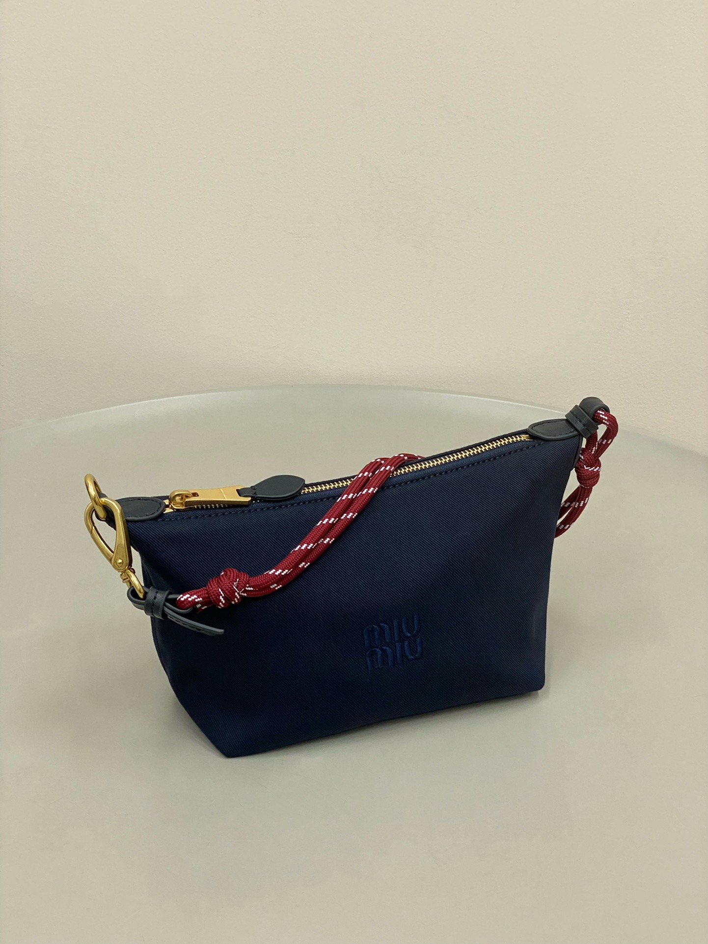 미우미우 게버딘 파우치